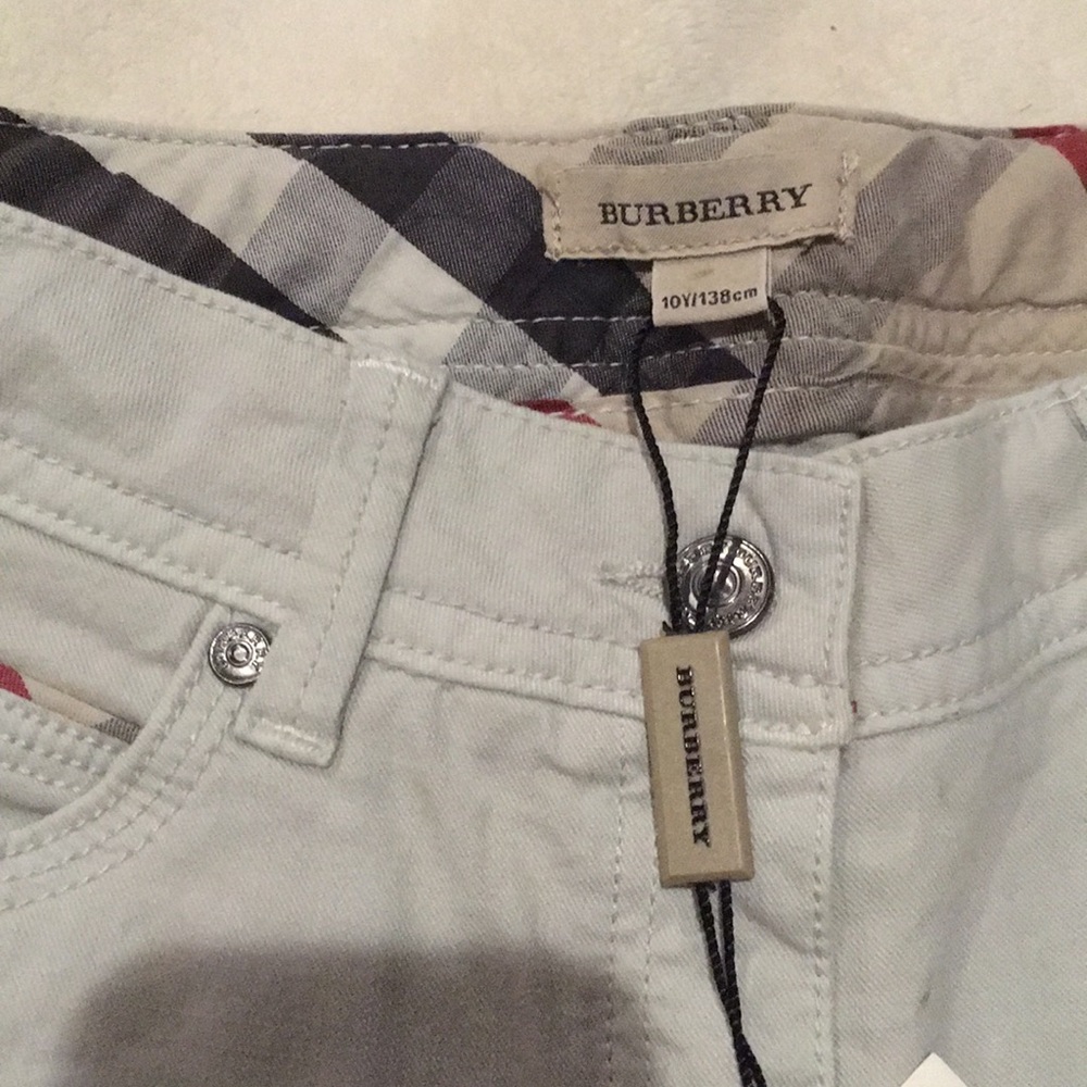 Burberry light beige or white jeans for girl.